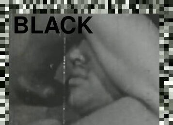 Black and white vintage video of lady sucking her lover