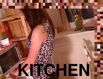 Sexy brunette goes kinky at the kitchen