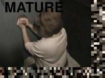 Cute mature at the gloryhole