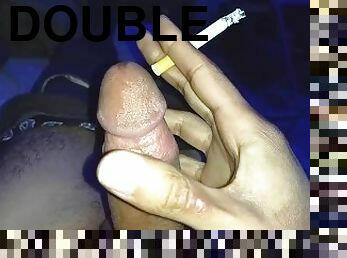 double fisting with condom while smoking