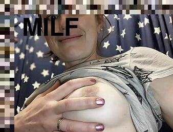 Sexy fun MILF plays with her perfect tits with frozen fingers to make her puffy nips come out to play 