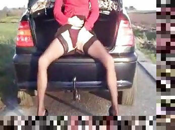 Hot slut inserts huge object near her car