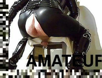 Kinky PVC crossdresser plays with inflatable buttplug and big anal toys