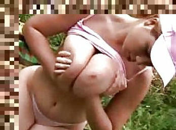 Big natural tit babe playing outdoors