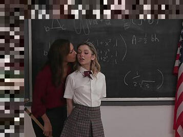 Teen schoolgirl and her mature teacher share the desk for lezzie sex