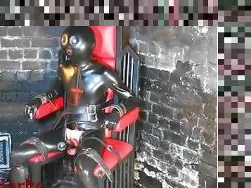 full latex gimp tied up tight in the milking chair