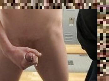 Public stroking in the locker room and almost caught