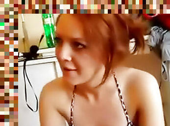 Redhead on her knees worships dick