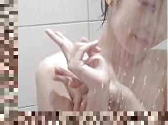 Asian girl with big natural boobs taking a shower with her perfect body