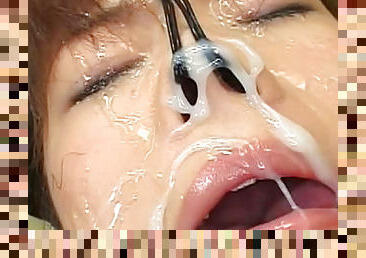 Cute Asian babe with gag in mouth gets sperm