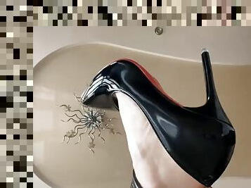 Foot fetish with a Christmas vibe - on high heels by Mistress Lara in latex