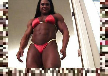 Huge mature bodybuilder with a mega ass poses