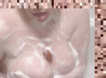 Brunette Soaps Up Her Big Natural Tits for a TIt Fuck and Soapy Handjob