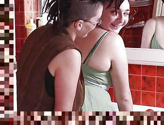 Hairy lesbians fuck in the bathroom