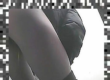 Hot slender woman is peeing in close-up video