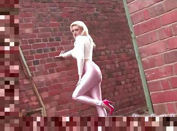 Hot blonde wearing pink disco pants and jimmy choo