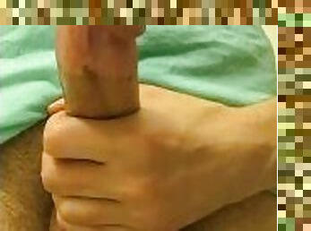 Guy cums hands free while holding cock