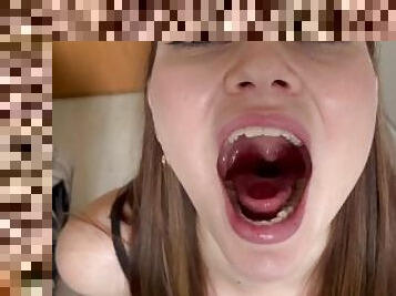 Excited giantess swallows gummy bears
