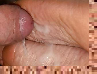 Very close up cock rub on very wrinkly soles