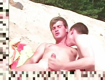 Twink handjobs on the beach