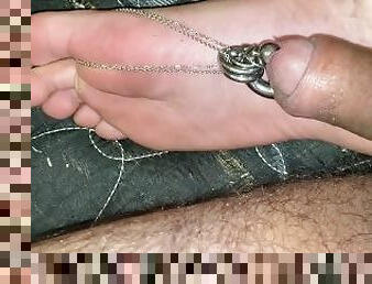 Compilation of a few videos of my cock chained to my feet, masturbating with my feet and showing my