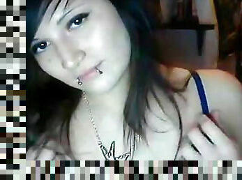 Pretty cute dark-haired emo is masturbating on the cam