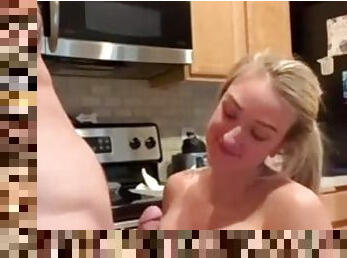 Australian wife swallows in the kitchen