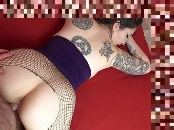 Inked beauty sits on all four and enjoys cock deeper than ever