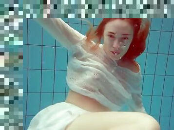 Swimming session in the pool of a naked sexy Russian girl