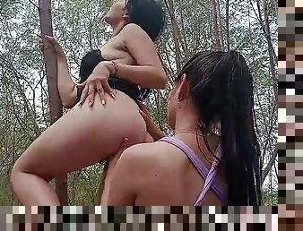 Step sisters couple meet in the park outdoors and get horny until they have lesbian sex with each other