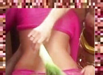 I think shes flogging her ass with a vegetable
