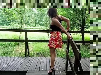 Mature exhibitionist flashes in public park and reaches orgasm using a remote vibrator