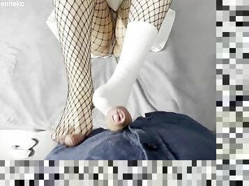 POV. Footjob. A girl in mesh tights lazily massaging my cock