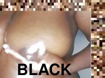 Black ebony milf with a oily sexy boobs milking her big sexy tits.